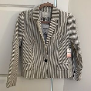 Grey and white striped woman’s  blazer